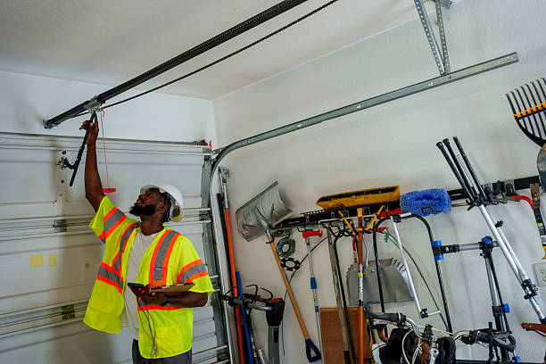 Professional Garage Door Panel Replacement technician working in Rochester, NY